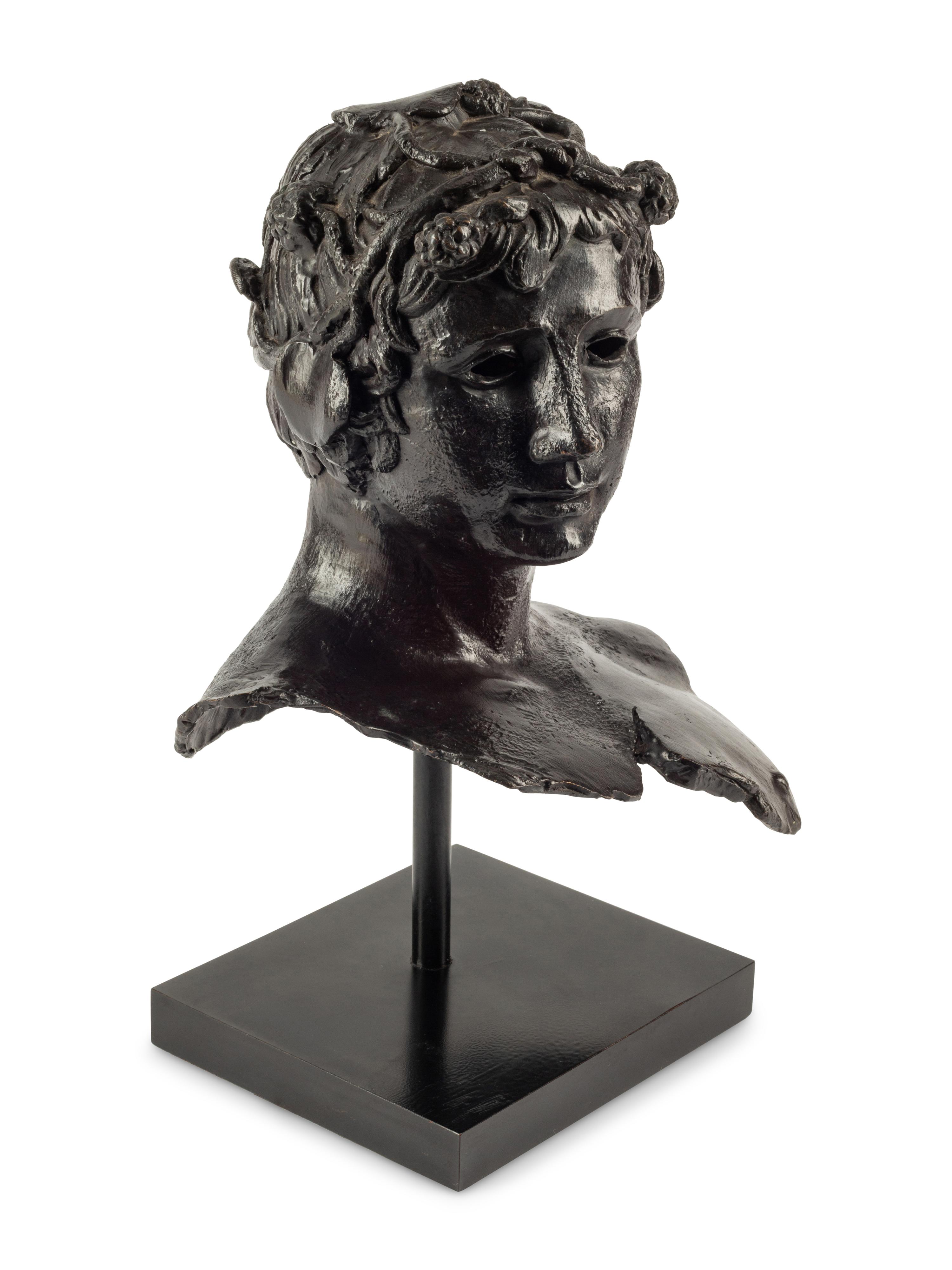 A Continental Bronze Head of Bacchus
