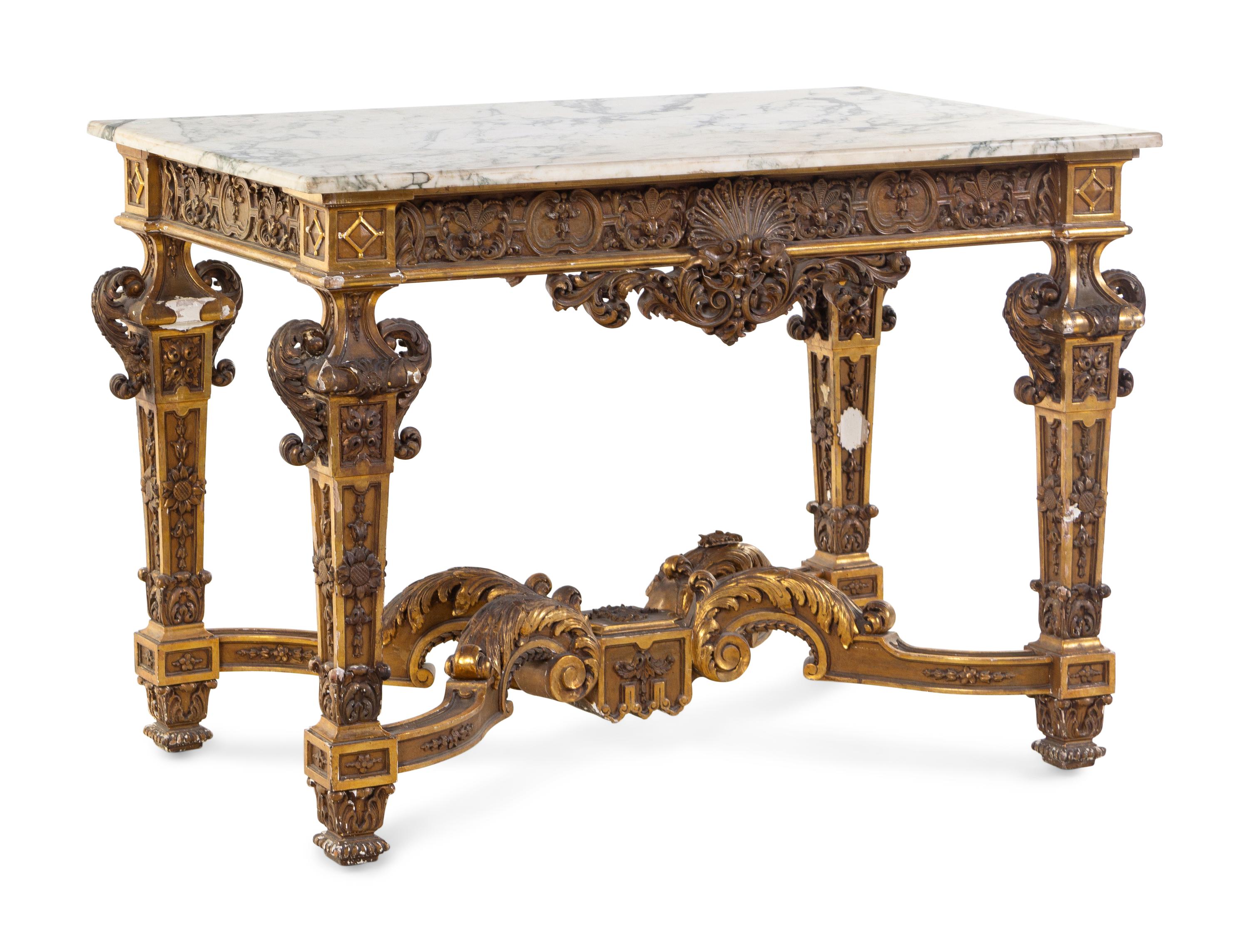 An Italian Carved Giltwood Marble-Top Center Table