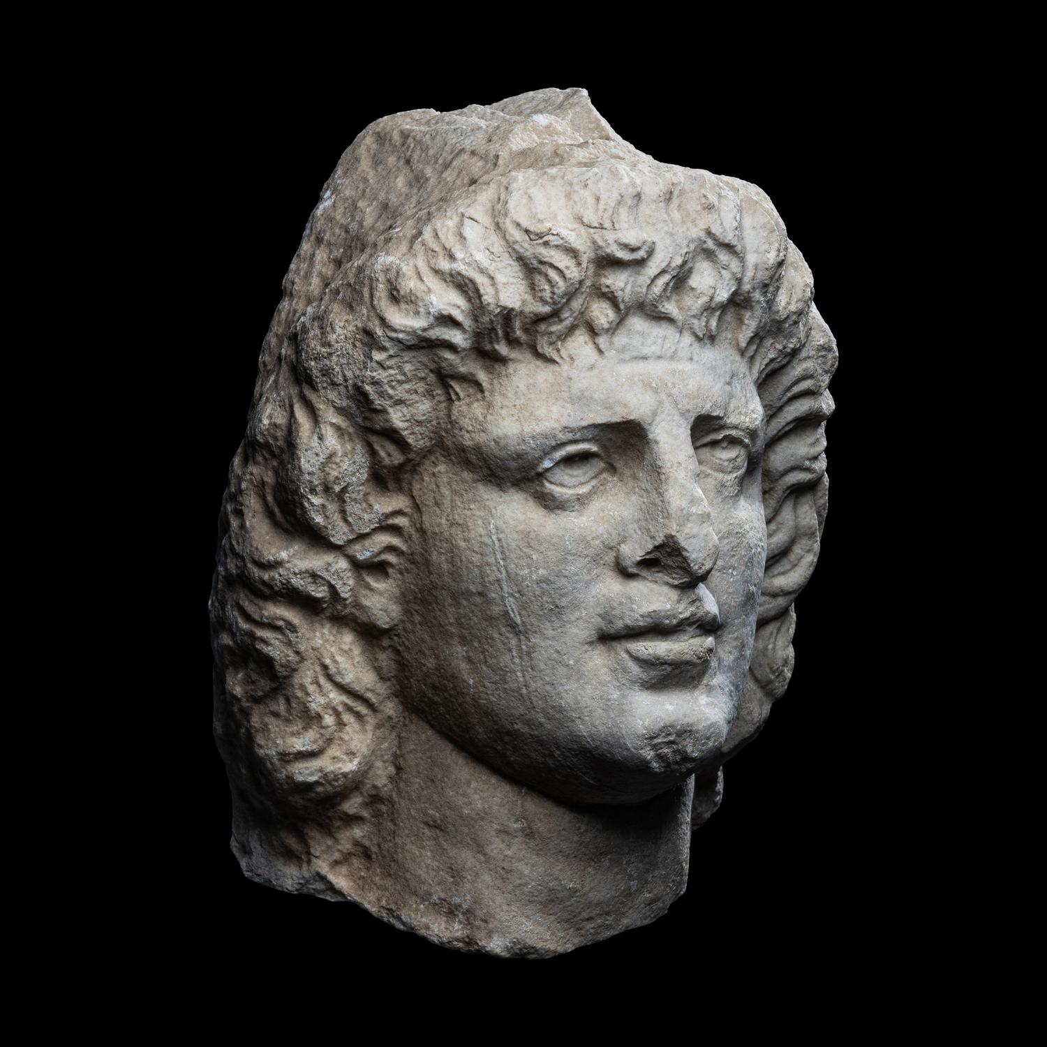 A Roman Marble Head of a Dioscuri