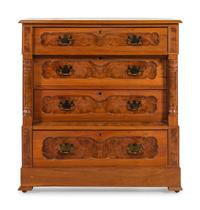 An American Eastlake Walnut and Maple Chest of Drawers