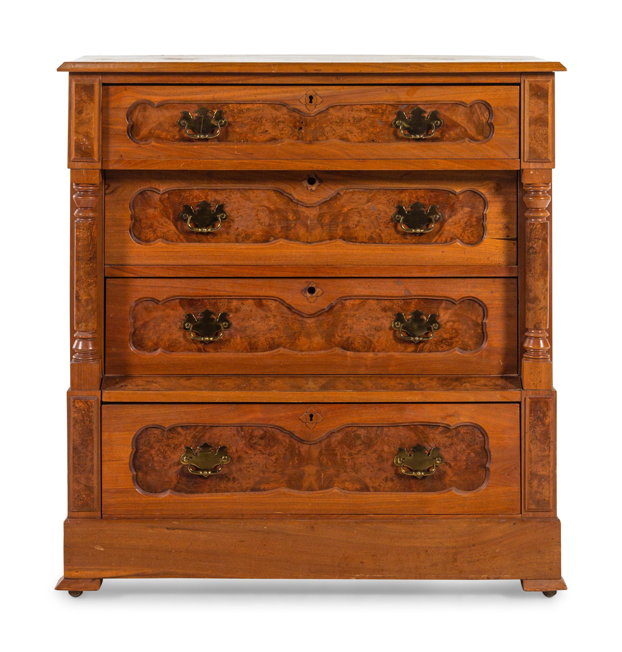 An American Eastlake Walnut and Maple Chest of Drawers