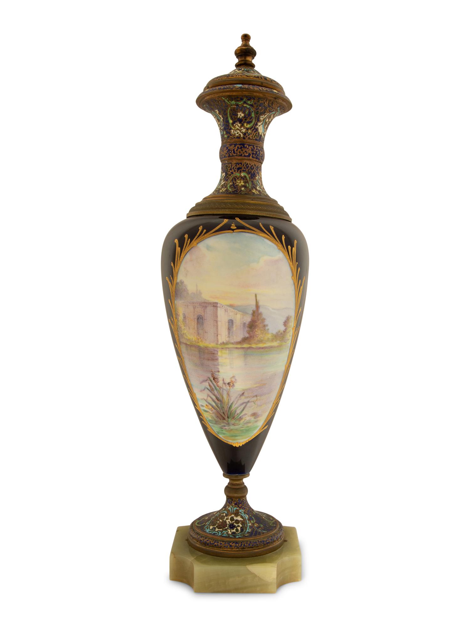 A Sevres Style Porcelain And Champleve Enamel Covered Urn with Gilt Bronze Mounts — 19TH CENTURY