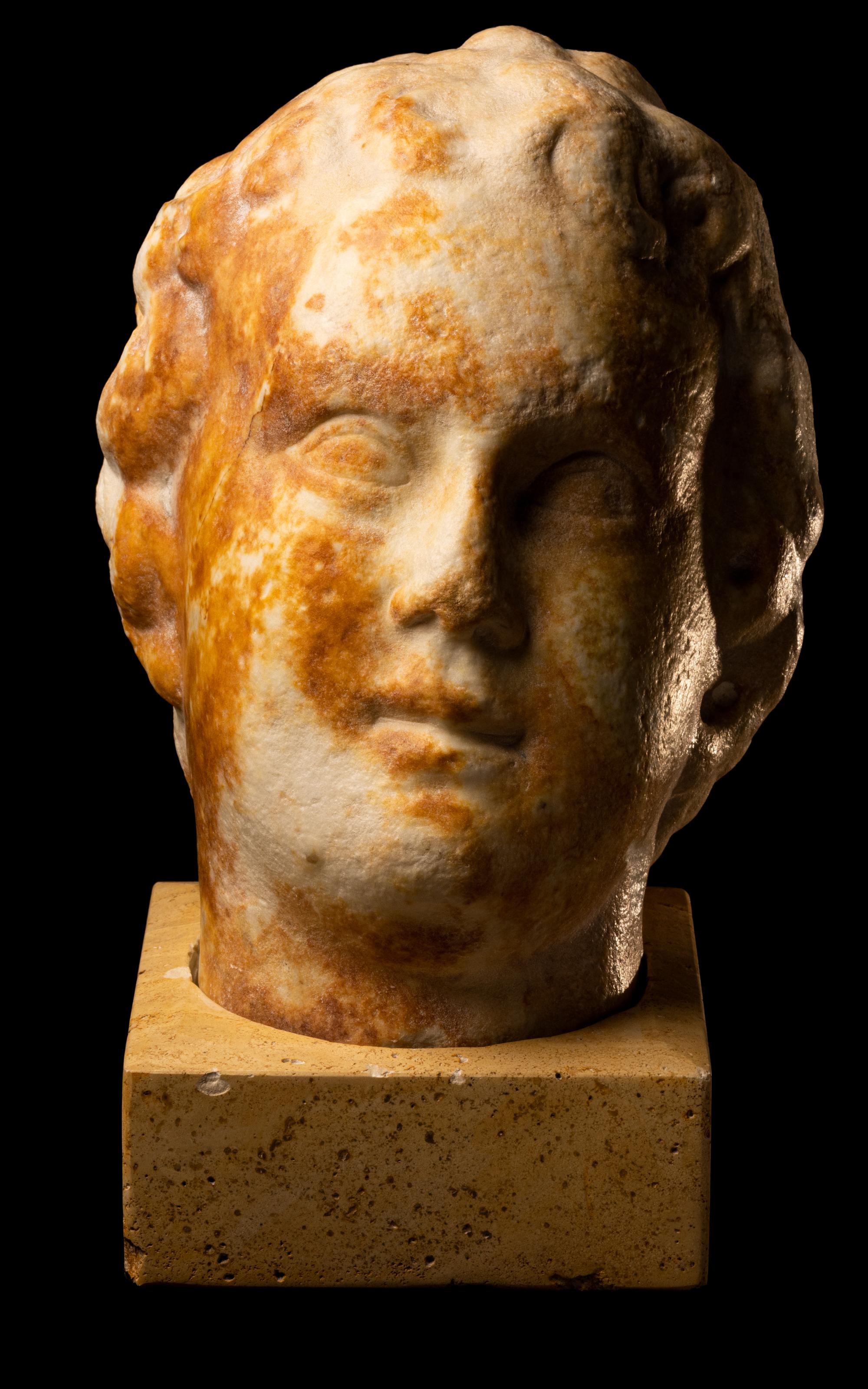 A Large Roman Marble Portrait Head of a Youth