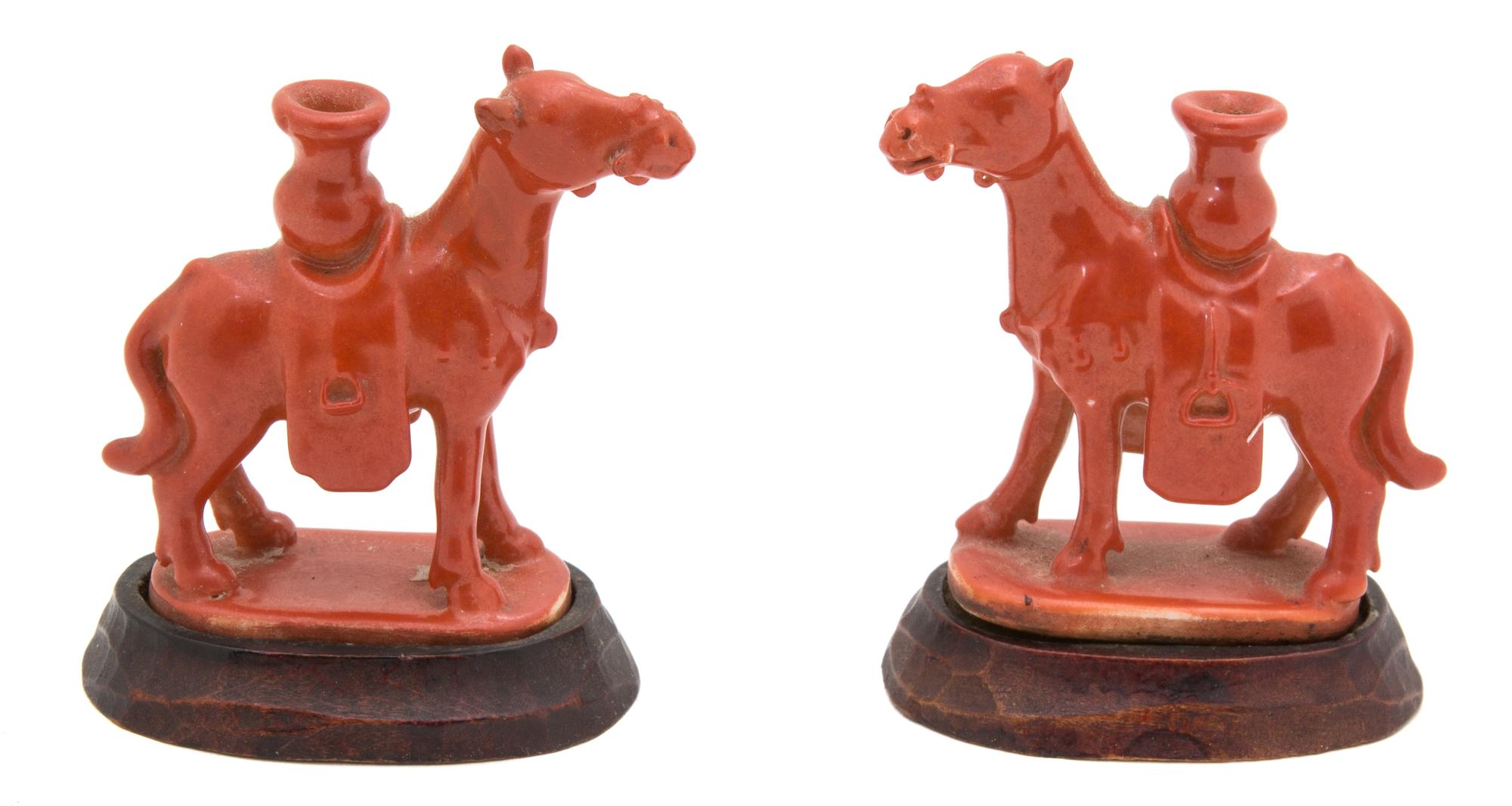 A Pair of Glazed Porcelain Figures of Camels Height 2 1/4 inches.