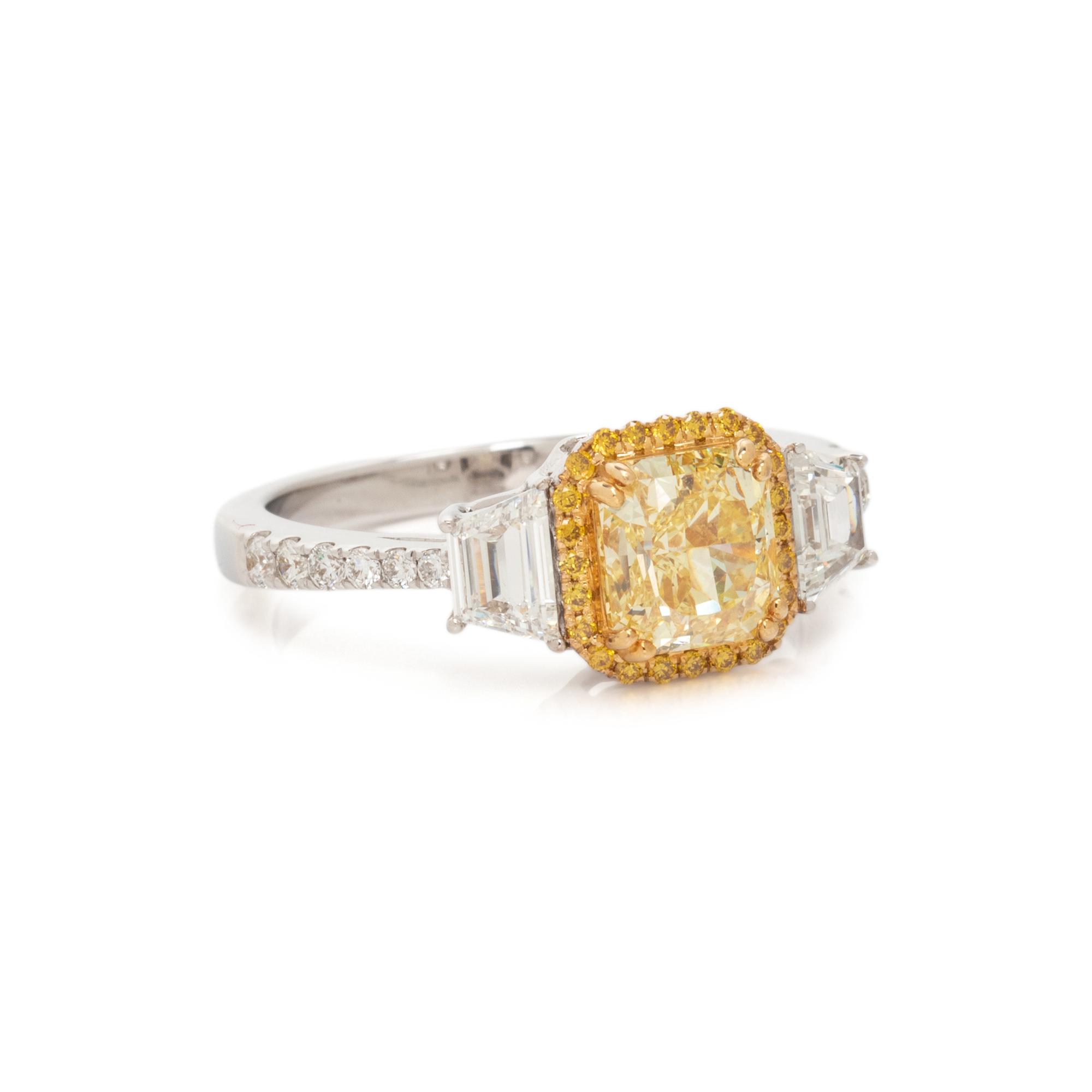 FANCY INTENSE YELLOW DIAMOND AND DIAMOND RING