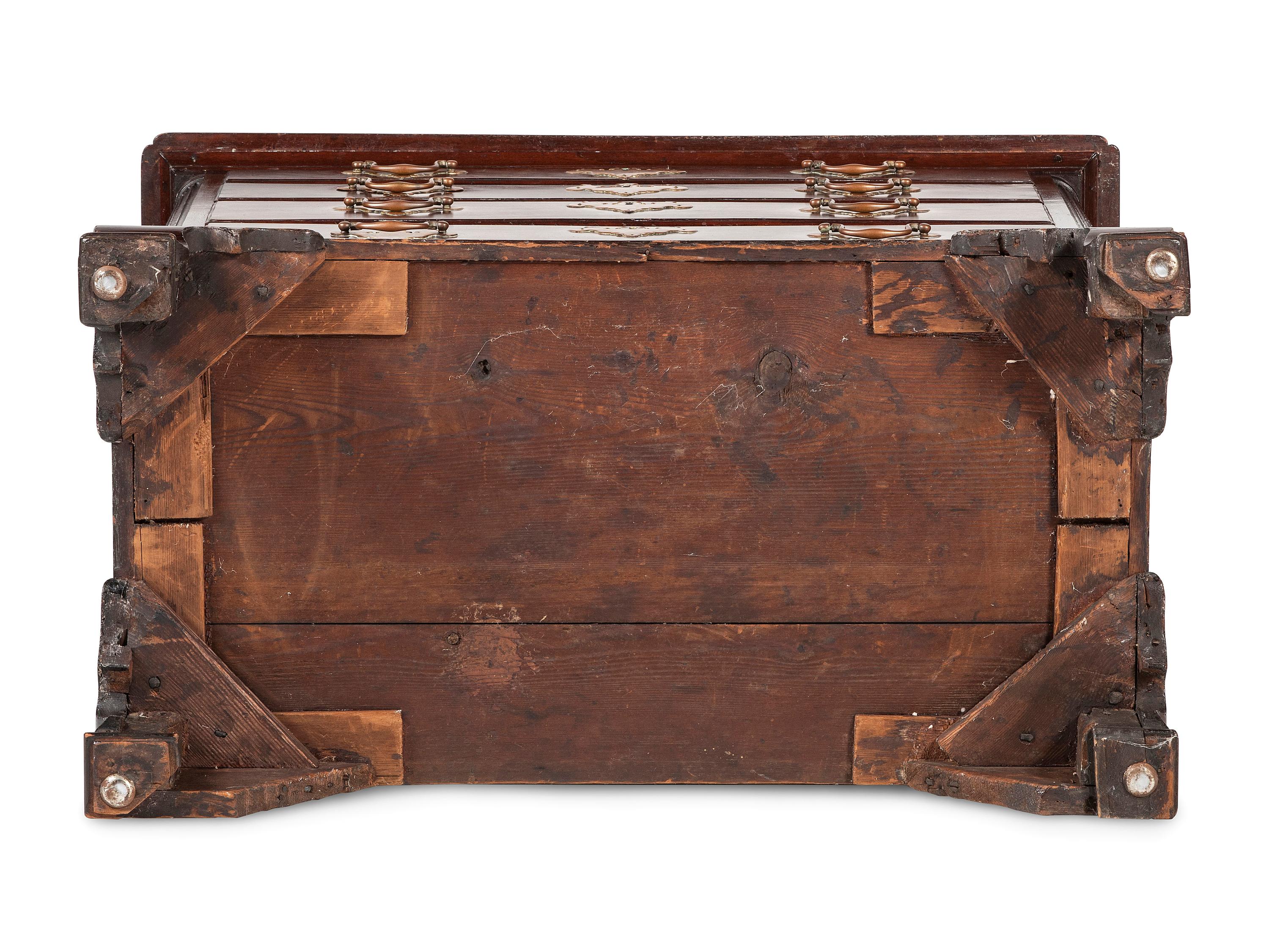 A Chippendale Carved and Figured Mahogany Chest of Drawers