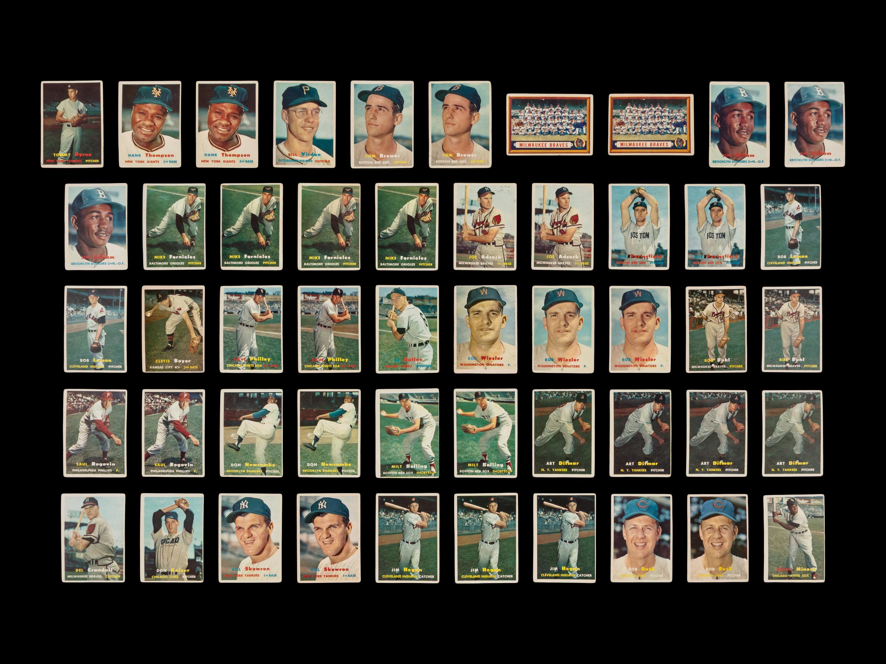 A Collection of 1957 Topps Baseball Cards Including Hall of Famers and Rookies (241)