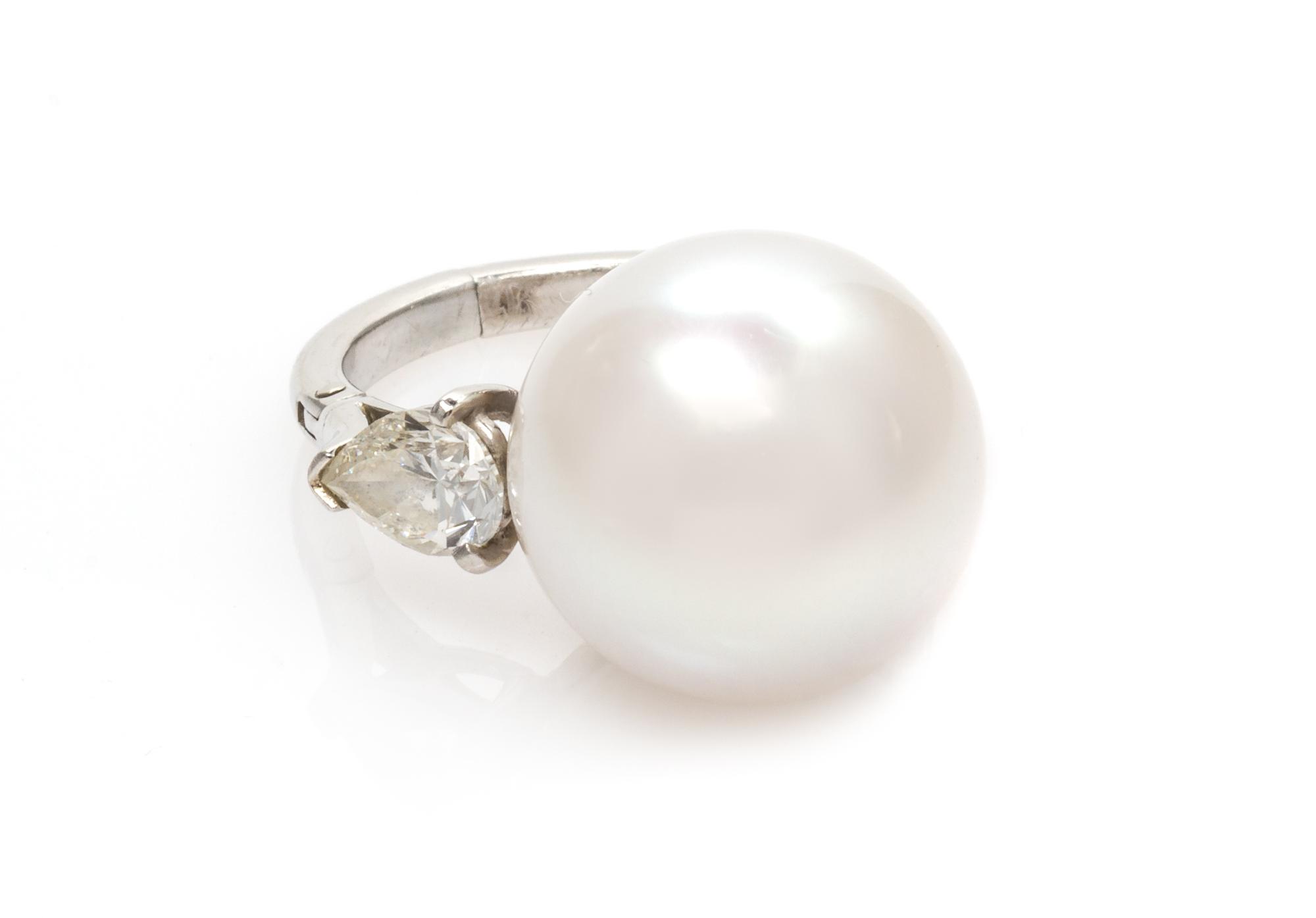 A Platinum, Cultured South Sea Pearl and Diamond Ring, 7.95 dwts.