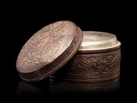 A Bronze Circular Box and Cover