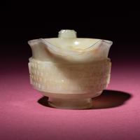 A Chinese Pale Celadon Jade Archaistic Yi Vessel, 17th Century — 清早期 青白玉仿古龍紋匜