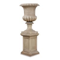 A Pair of Carved Granite Urns and Plinths