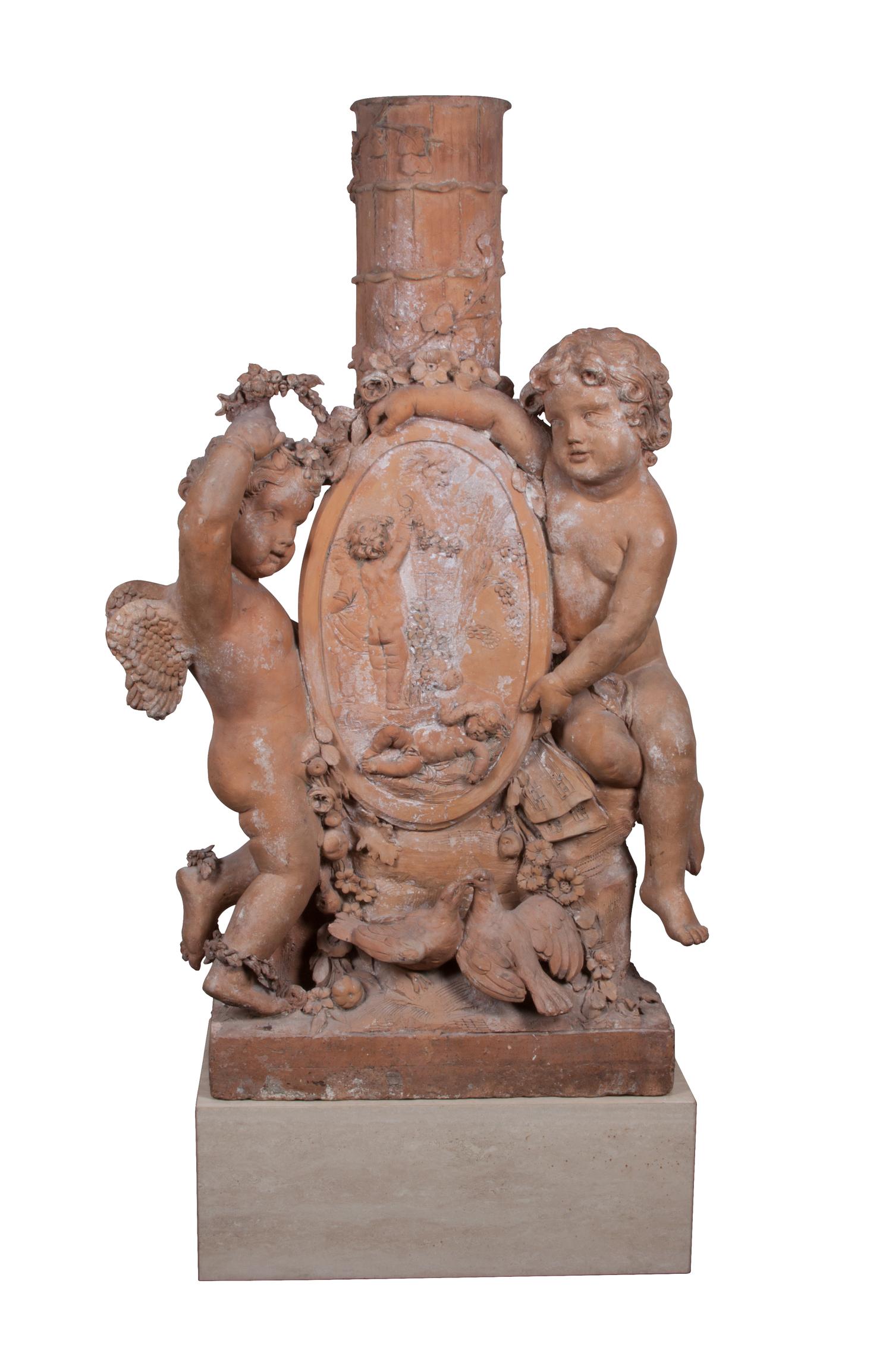A Continental Terracotta Figural Chimney Height 63 1/2 inches. — LIKELY 19TH CENTURY