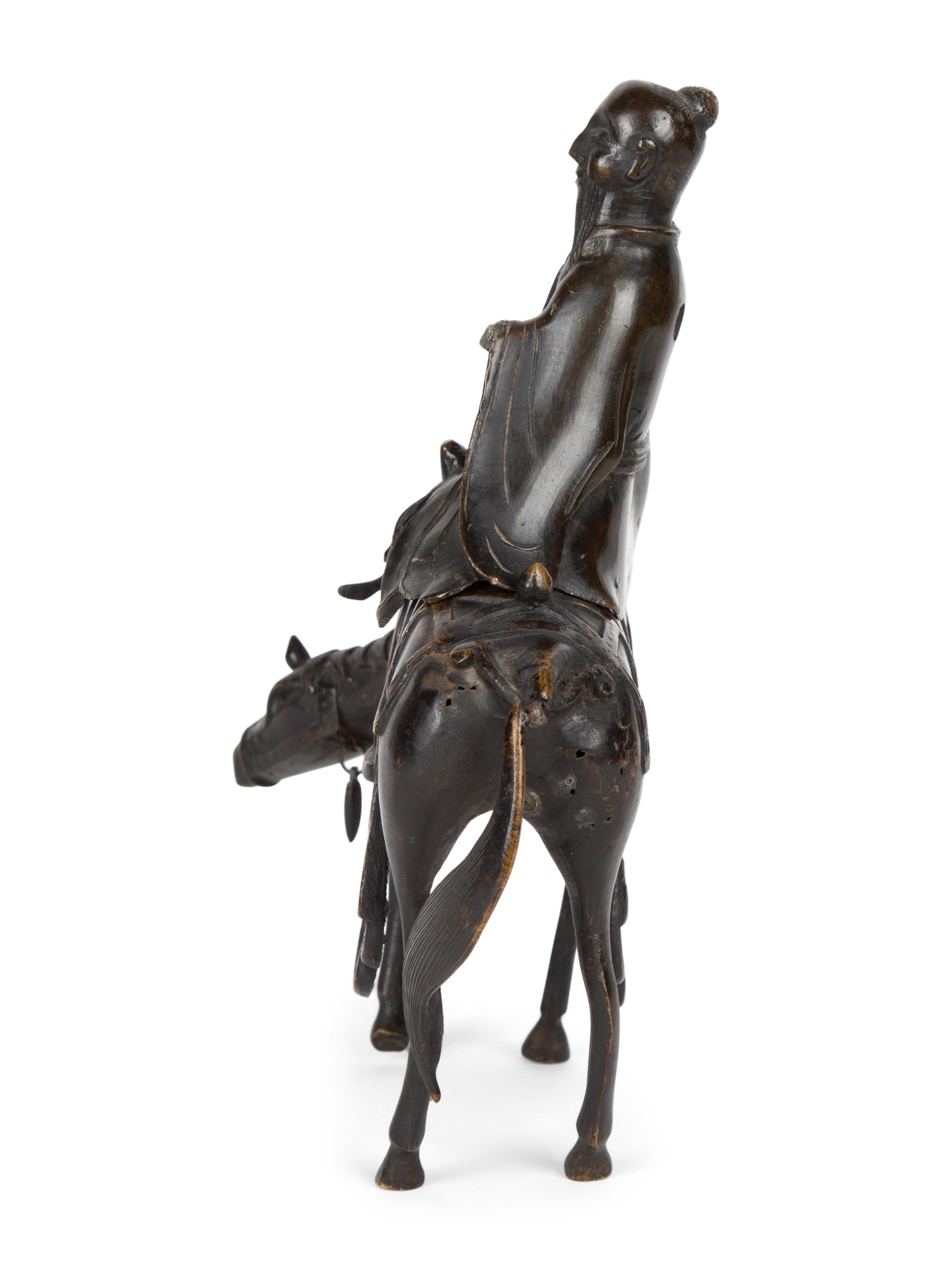 A Chinese Bronze Figure of Shoulao on Horseback — 20TH CENTURY