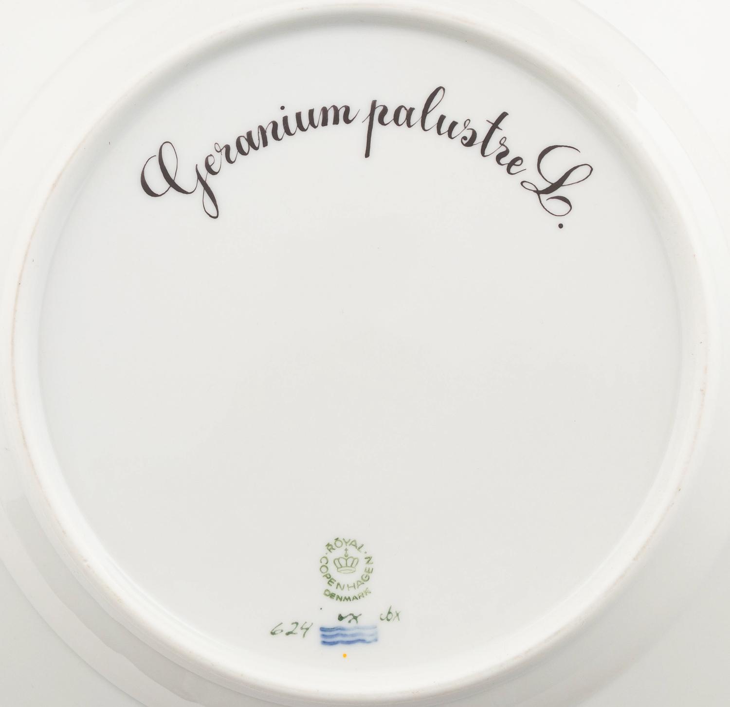 A Set of Eight Royal Copenhagen Flora Danica Porcelain Luncheon Plates