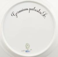 A Set of Eight Royal Copenhagen Flora Danica Porcelain Luncheon Plates