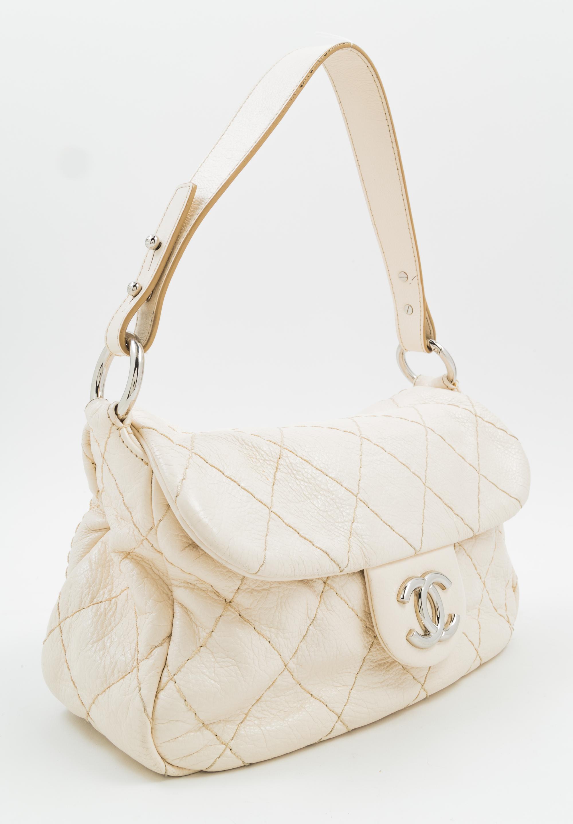 A Chanel Cream Leather Wild Stitch Shoulder Bag, 12" x 8" x 3.5"; Handle drop: 8.5".