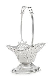 An American Silver Basket, William B. Durgin Co., Providence, RI, 20th Century, having a fixed handle and a pierced body.