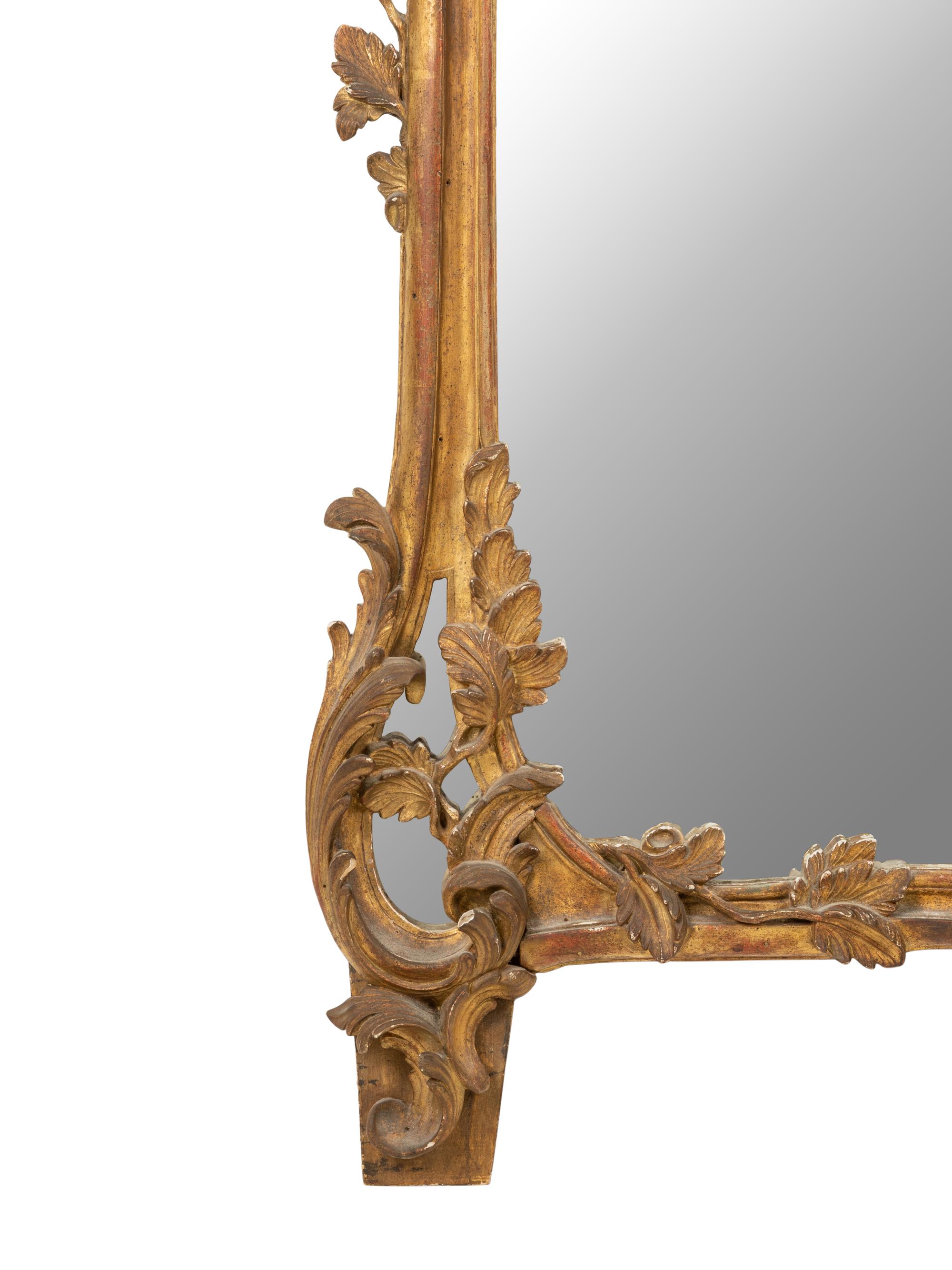 A Rococo Style Giltwood Mirror