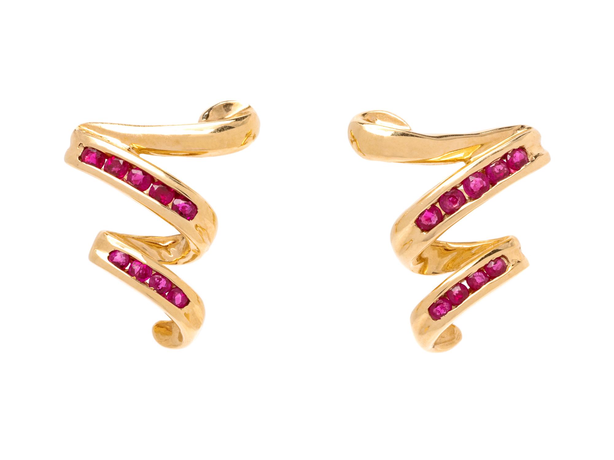 A Pair of 14 Karat Yellow Gold and Ruby Earrings,