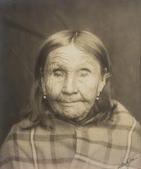 Edward S. Curtis (1868-1952) Untitled portrait (Native American Woman in Plaid Shawl,) c. 1900