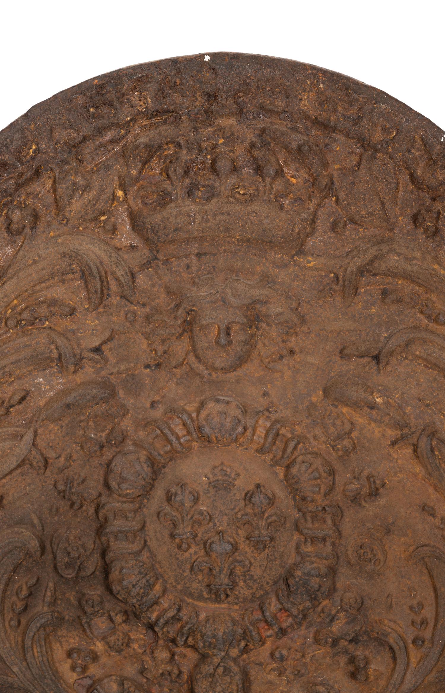 A Cast Iron Fireplace Back