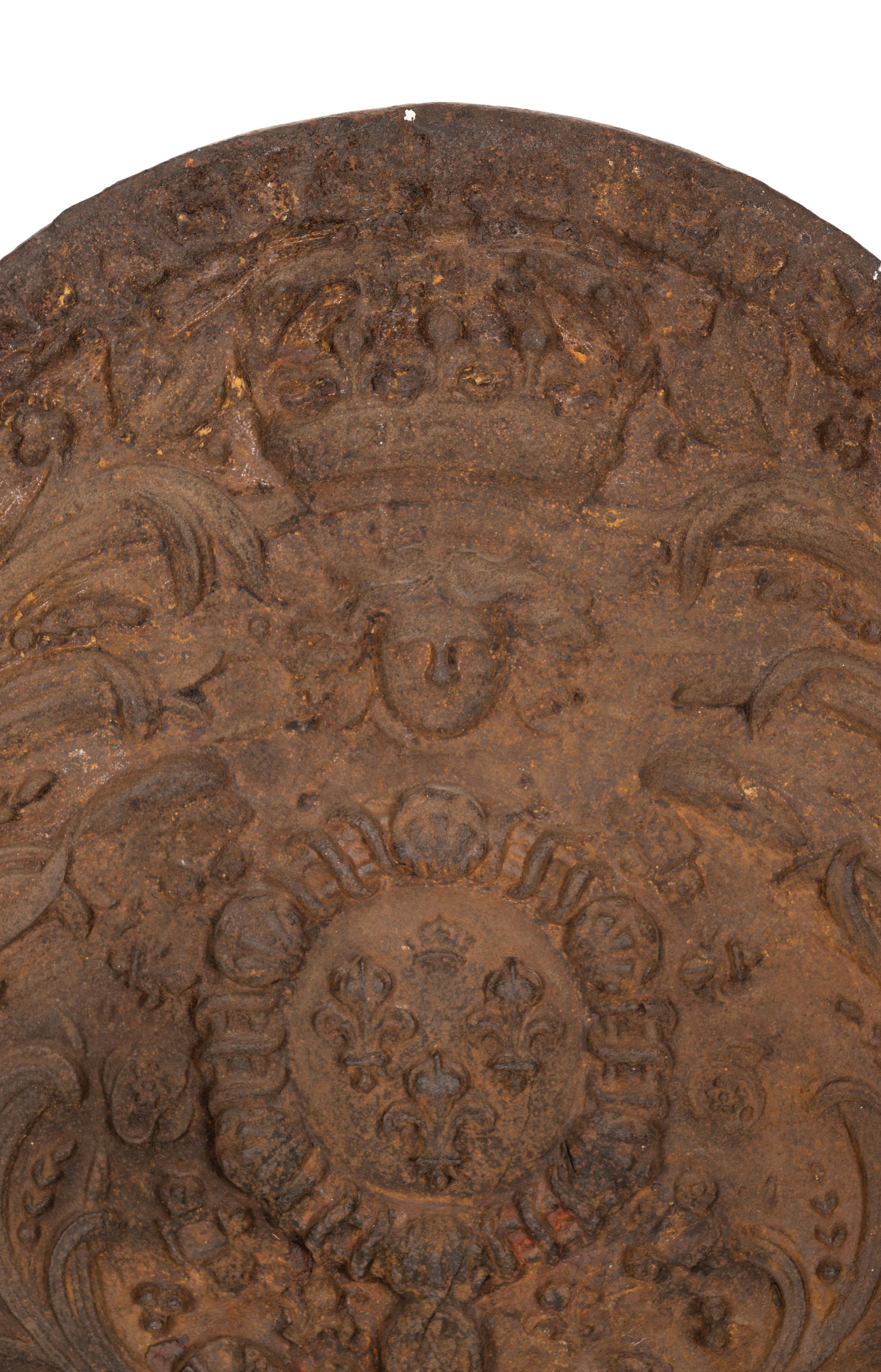 A Cast Iron Fireplace Back