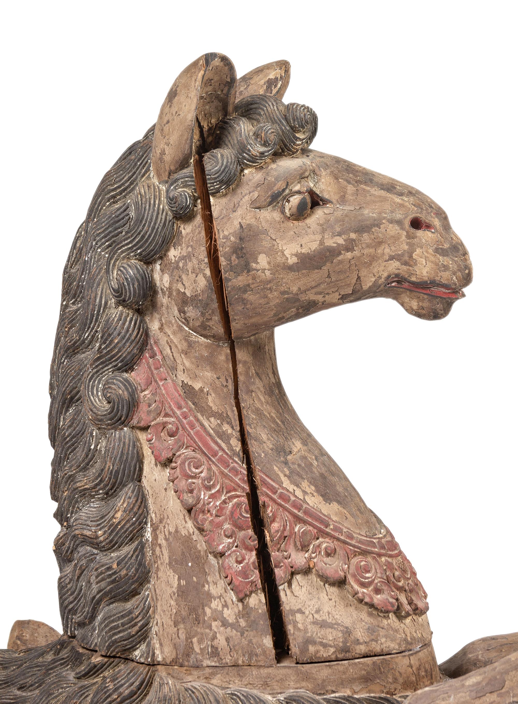 A Pair of Large Balinese Carved and Polychrome Decorated Models of Hippocampi