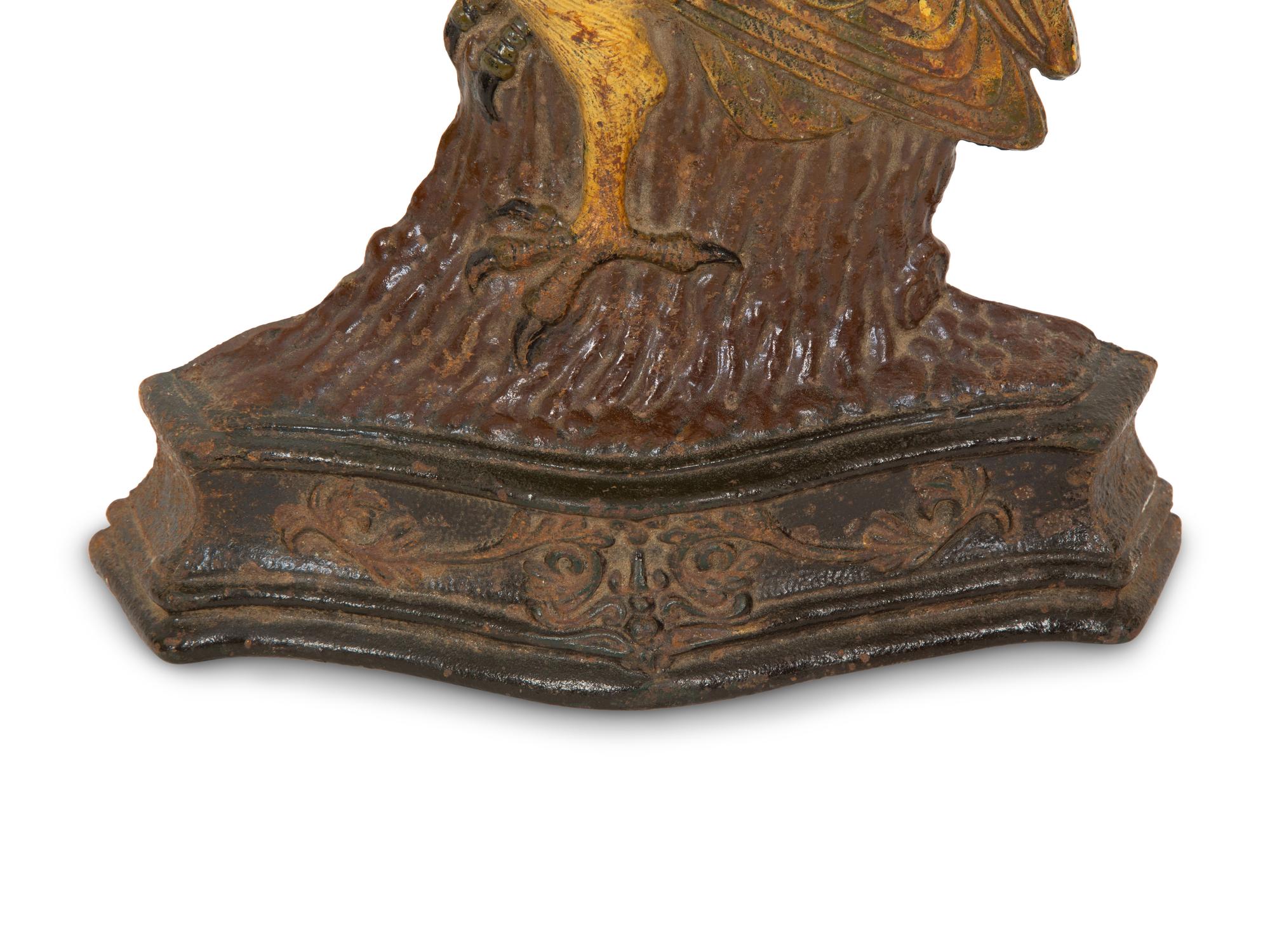 A Painted Cast Iron Owl Doorstop