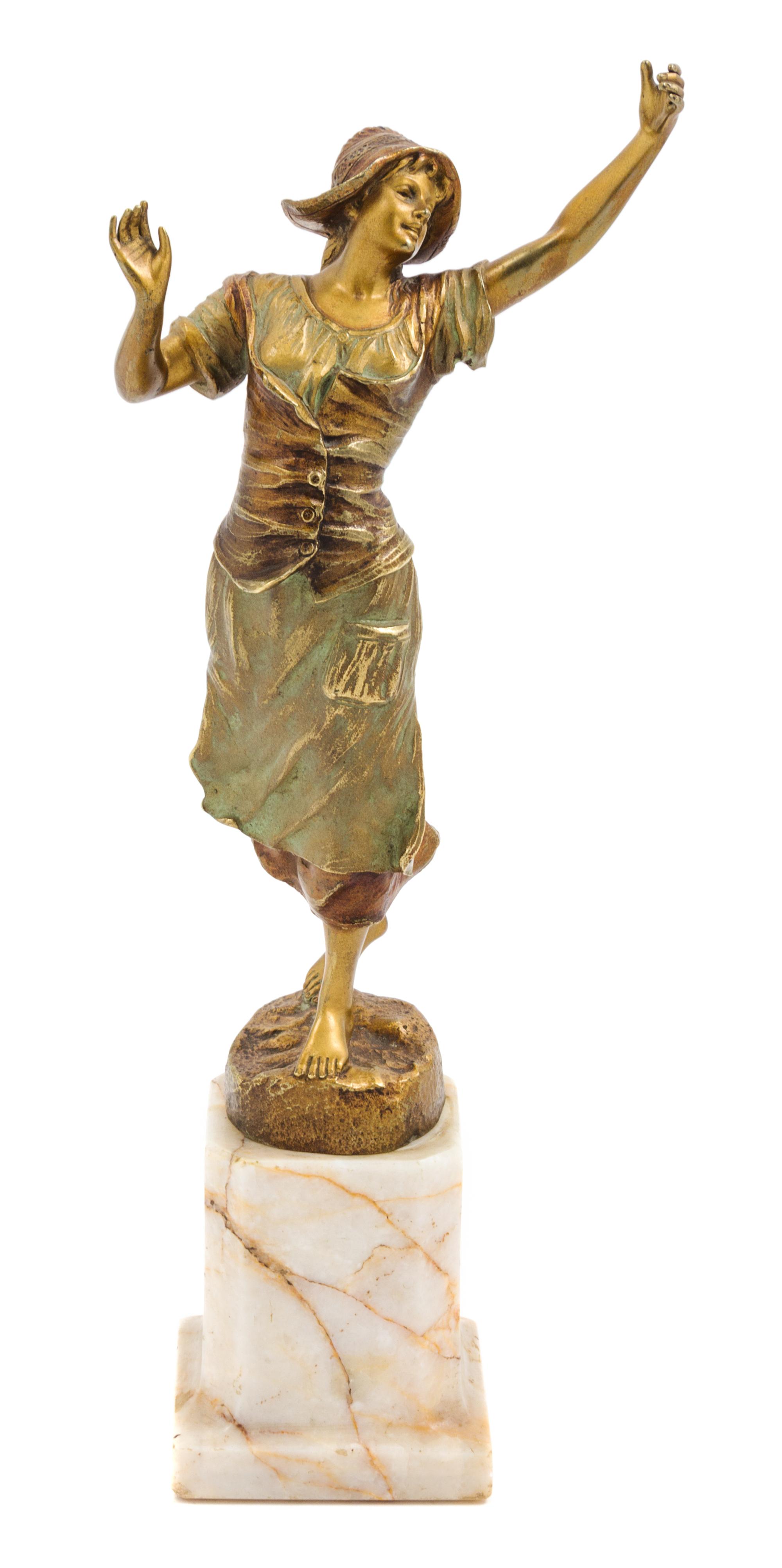 A French Gilt Bronze Figure Height overall 15 3/8 inches.