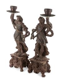Two Neapolitan Carved and Painted Figural Pricket Sticks