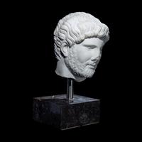 An Over Life-Size Roman Marble Portrait Head of Emperor Hadrian