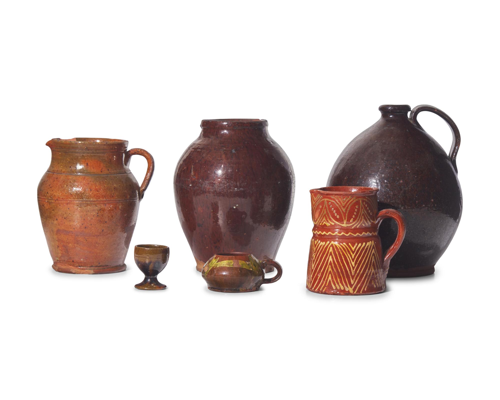 An Assorted Group of Six Glazed Redware Tablewares