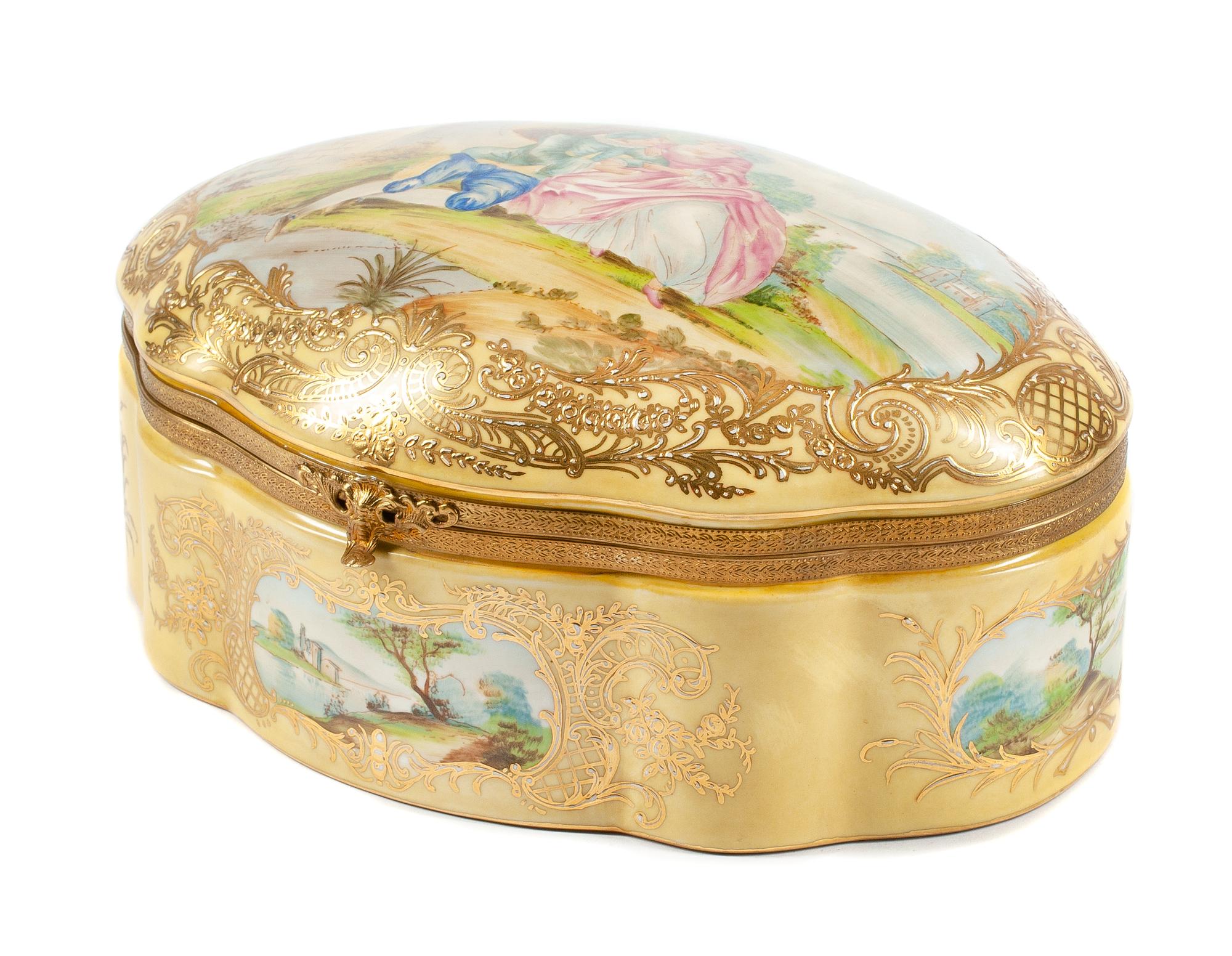A Sevres Style Porcelain Casket Width 11 1/2 inches.