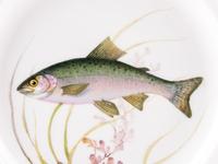 A Set of Twelve Royal Copenhagen Parcel Gilt Porcelain Fish Plates