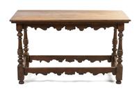 A Jacobean Revival Hall Table, Height 31 x width 53 x depth 25 1/2 inches.