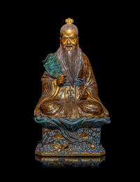 A Chinese Gilt Highlighted Robin's Egg Glazed Porcelain Figure of an Immortal