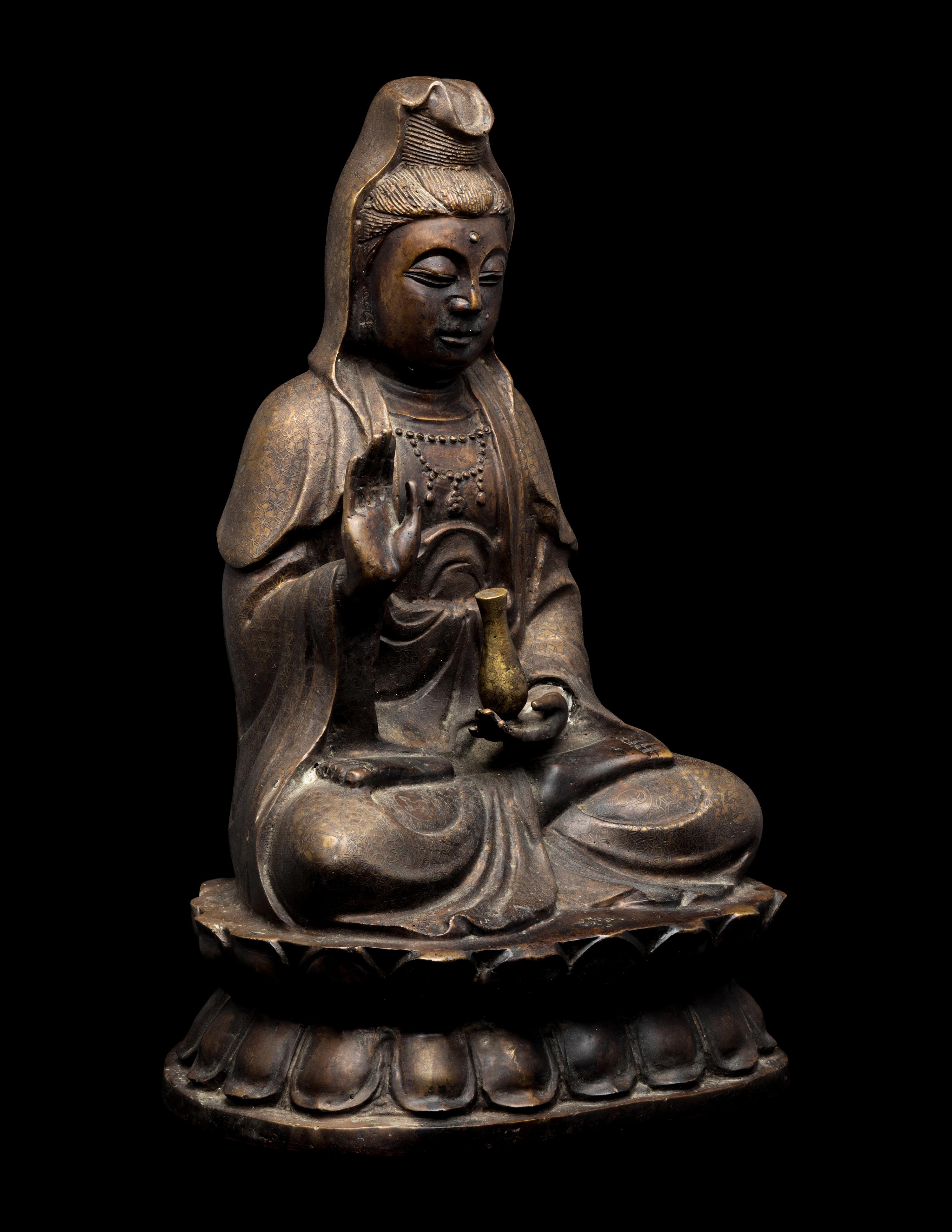 A Chinese Bronze Figure of Guanyin 銅觀音