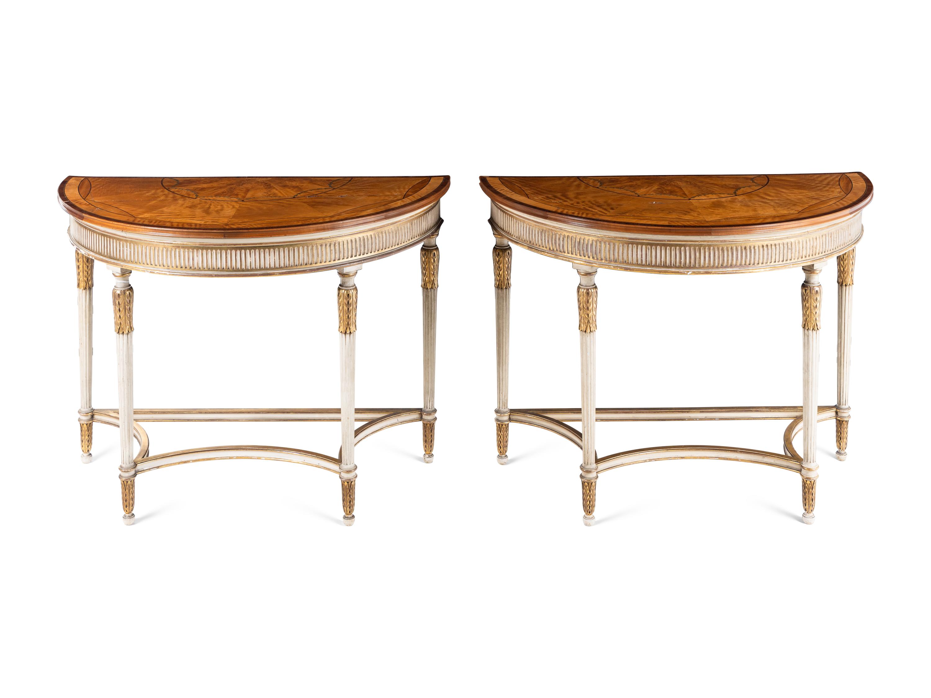 A Pair of George III Style Painted and Parcel Gilt Satinwood and Marquetry Demilune Console Tables