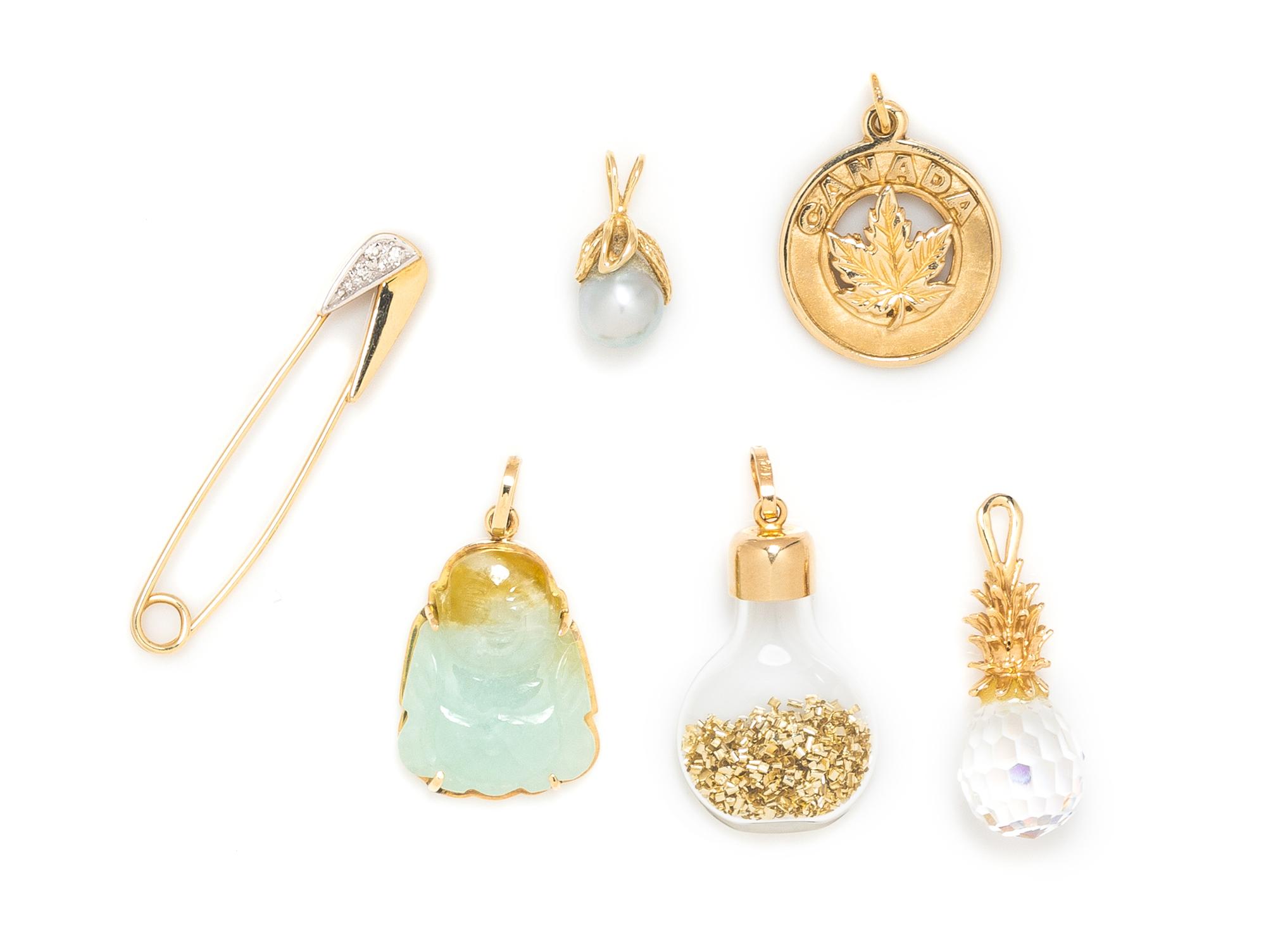 A Collection of Yellow Gold and Gemstone Charms, 13.90 dwts.