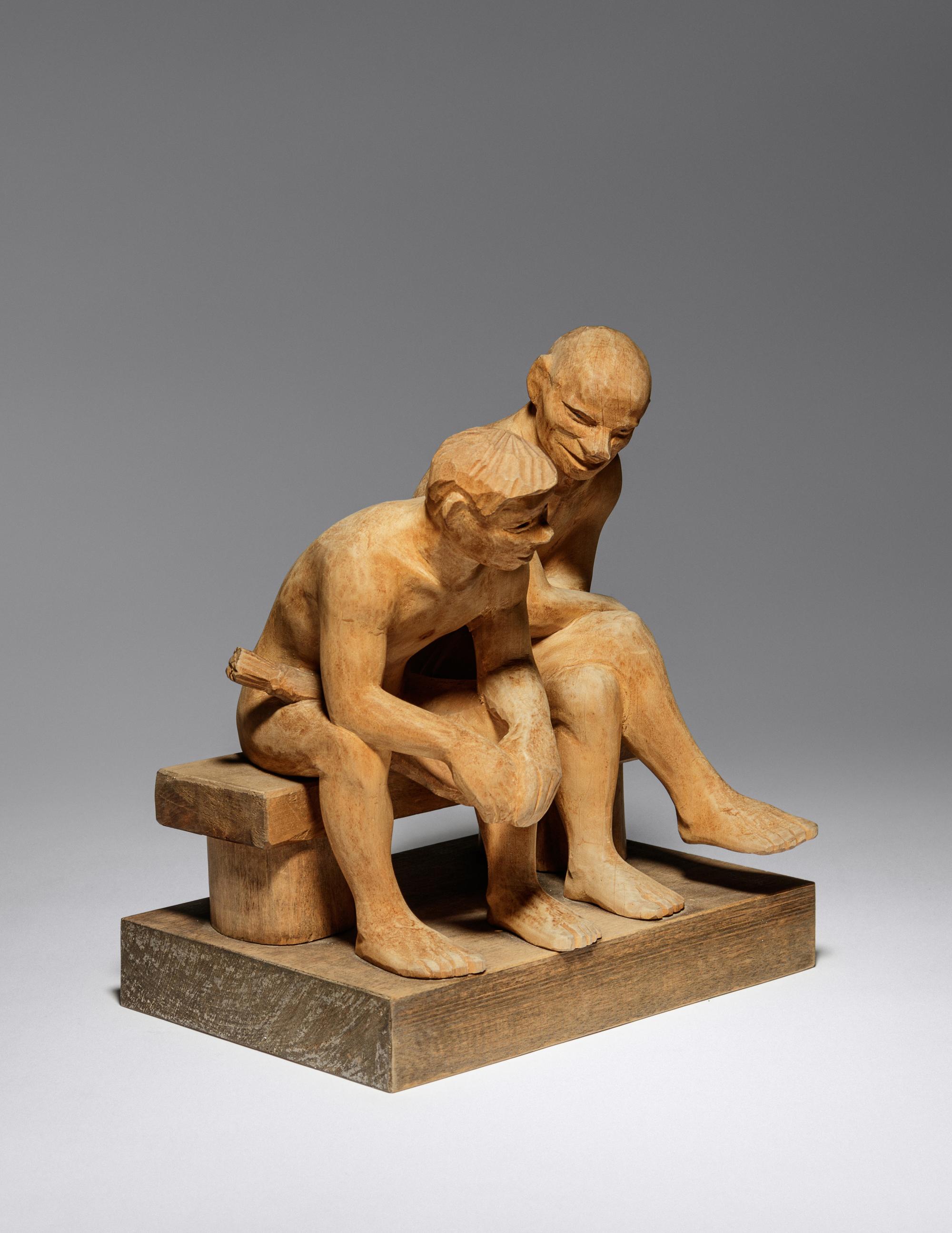 Two Seated Figures