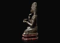 A rare Chinese patinated bronze figure of Guanyin, Yunnan, 12th to 14th century 珍罕銅加漆觀音像及底座 雲南大理 十二至十四世紀
