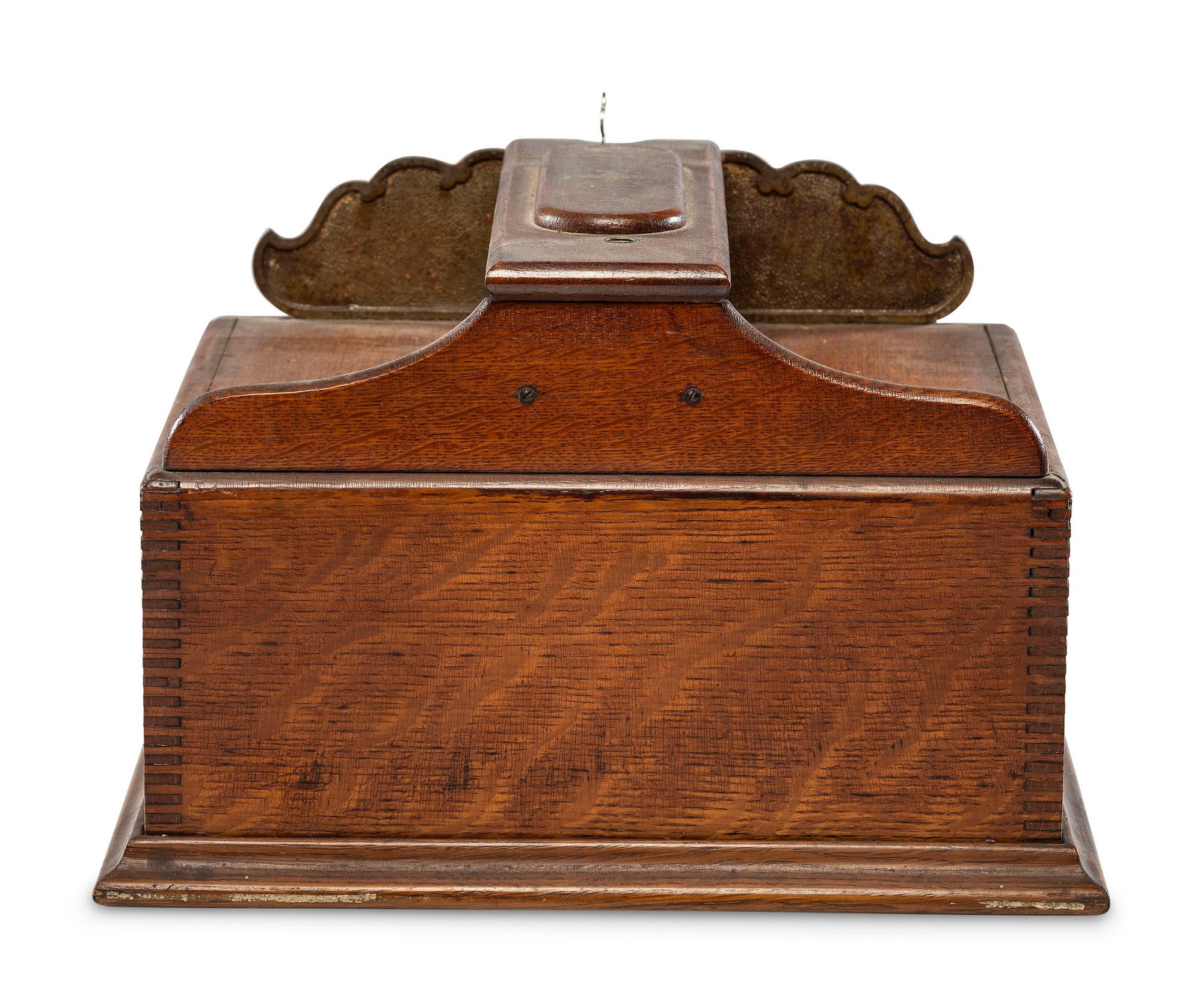 A Monitor Paint Decorated Oak and Cast Iron Coin-Operated Barbershop Cash Register