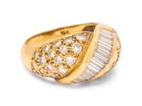An 18 Karat Yellow Gold and Diamond Ring,