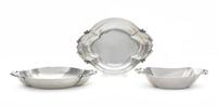 A Pair of American Silver Small Dishes, Cellini Craft, Ltd., Chicago, IL, 1940, each of shaped oval form, the ends decorated with buds