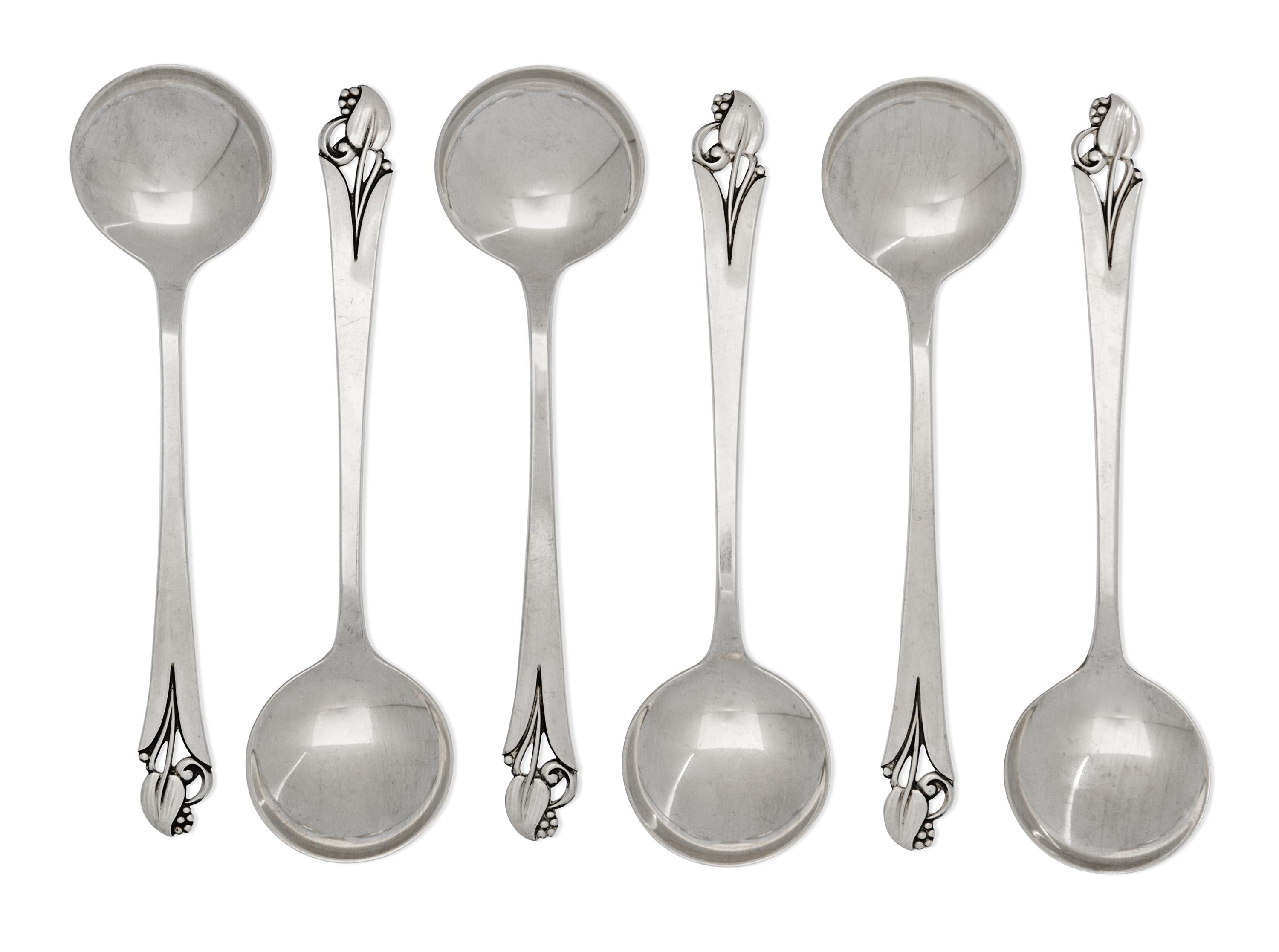 A Set of Twelve American Silver Bouillon Spoons, Frank W. Smith Silver Co., Gardner, MA, Mid-20th Century, the handles with berried blo