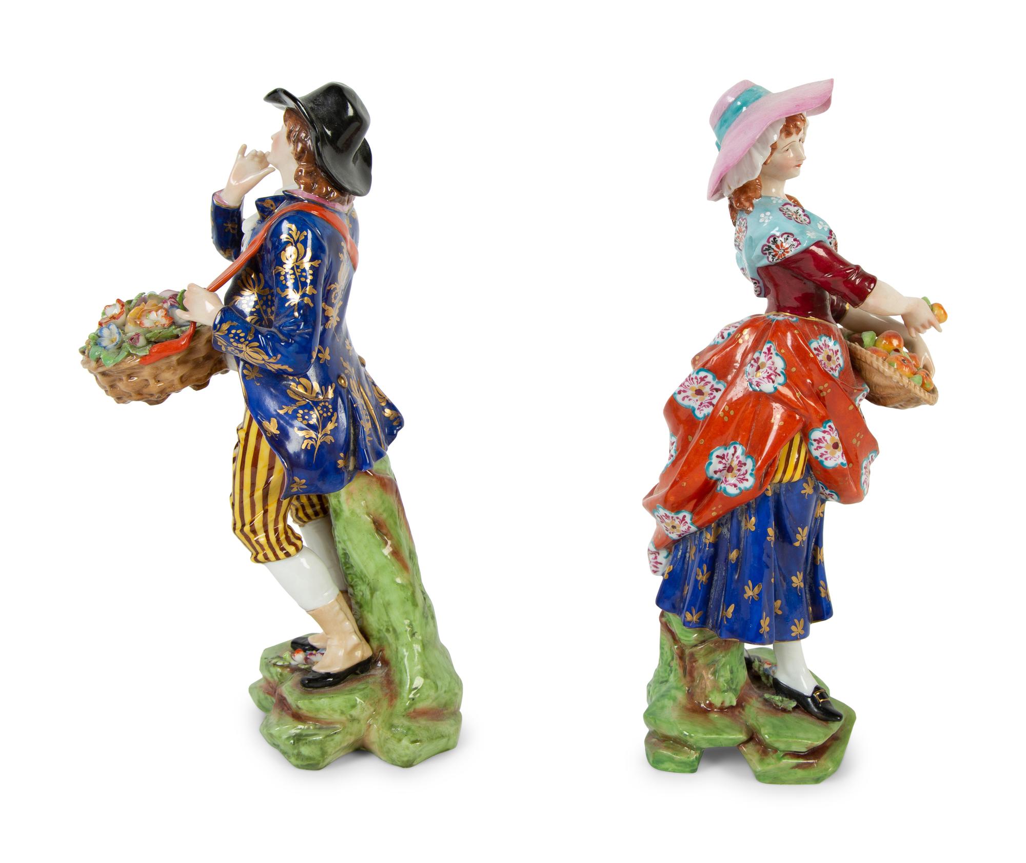 A Pair of Chelsea Porcelain Figures