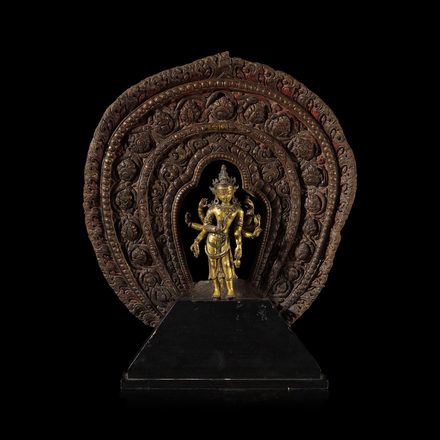 A Nepalese Gilt Bronze Standing Figure of Avalokiteshvara, 14th/15th Century 十四/十五世紀 尼泊爾銅鎏金菩薩立像