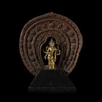 A Nepalese Gilt Bronze Standing Figure of Avalokiteshvara, 14th/15th Century 十四/十五世紀 尼泊爾銅鎏金菩薩立像