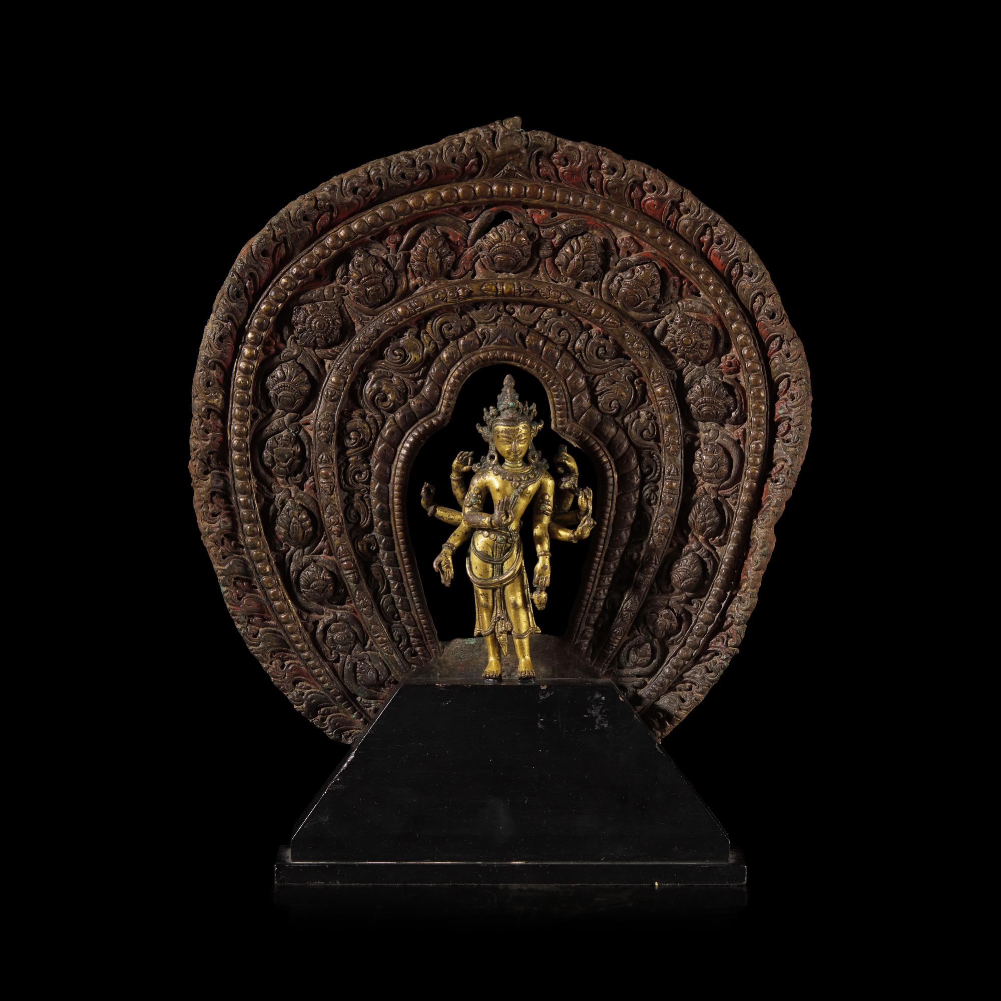 A Nepalese Gilt Bronze Standing Figure of Avalokiteshvara, 14th/15th Century 十四/十五世紀 尼泊爾銅鎏金菩薩立像