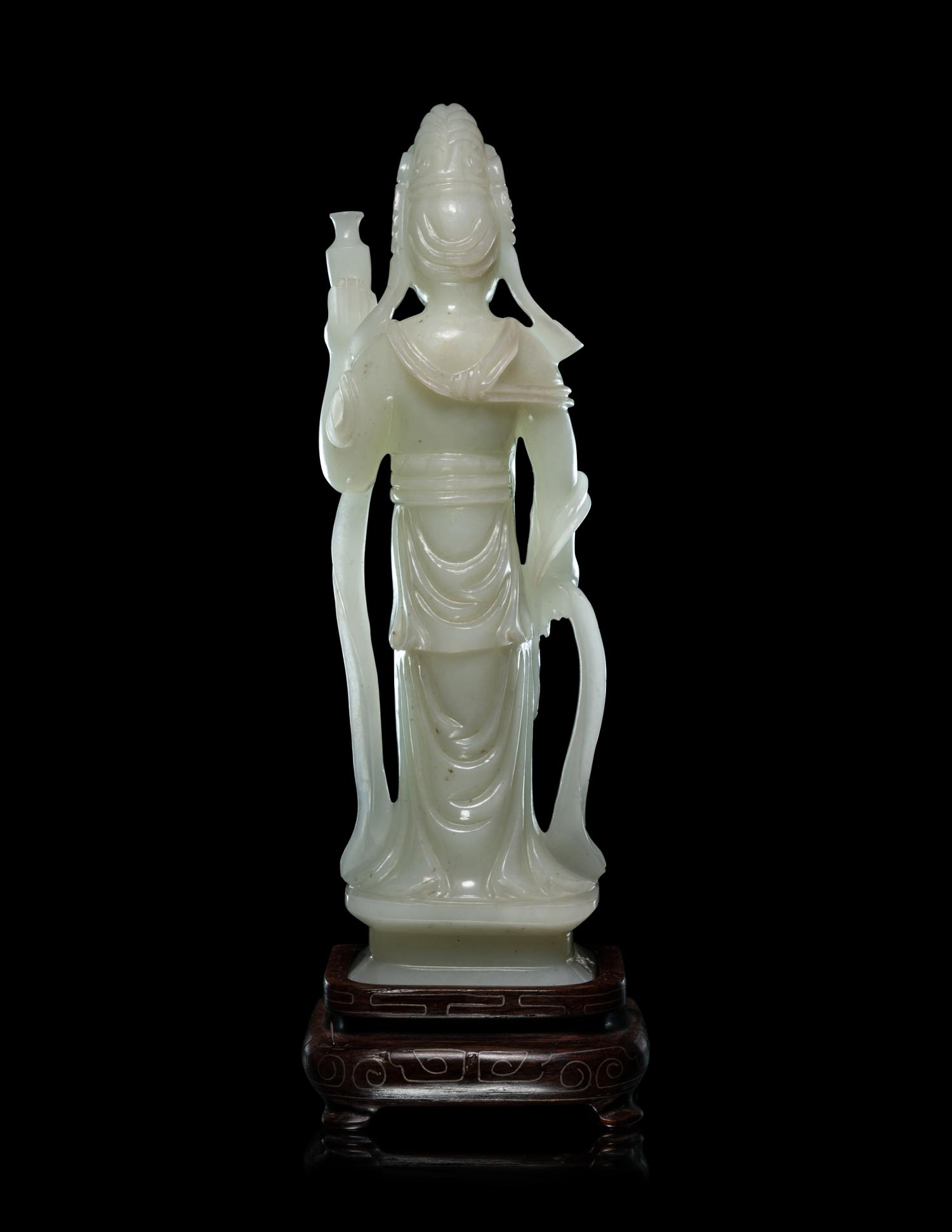 A Pale Celadon Jade Figure of Standing Guanyin